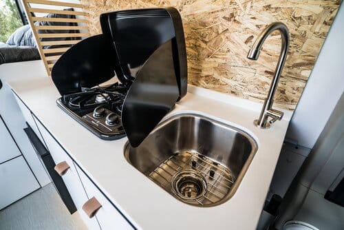 the kitchen of the Biggie van conversion rental