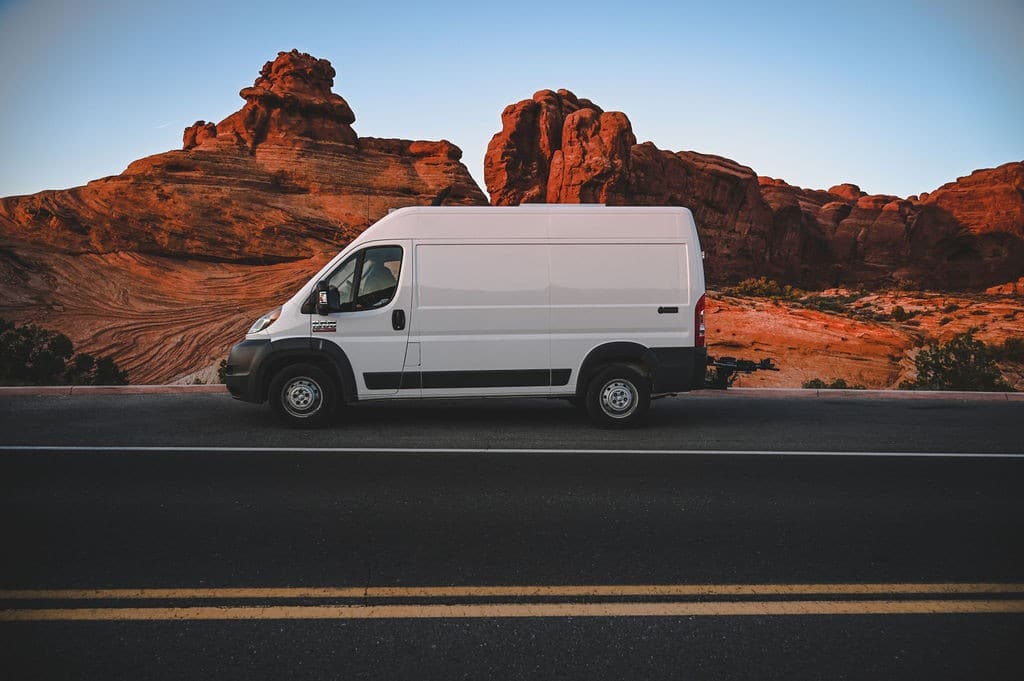 a conversion van for rent on the road in Moab